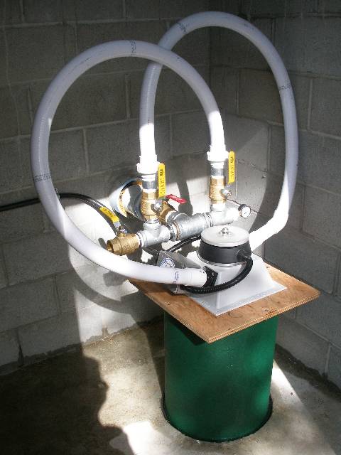 Turbine mounted on steel sump drain.